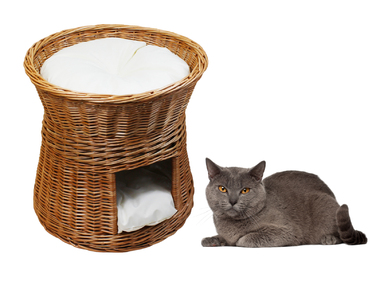 Плетений будинок-ліжечко з лози з подушками кольору екру